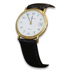 \"Bucherer\" quartz watch with a white dial and a black leather strap.